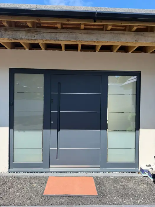 Contemporary aluminium front door installed by Team Frames in Surrey