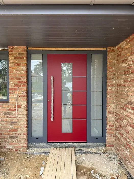 Contemporary aluminium front door installed by Team Frames in Surrey