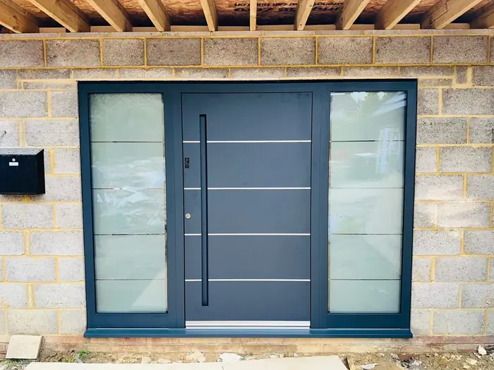 Contemporary aluminium front door installed by Team Frames in Surrey