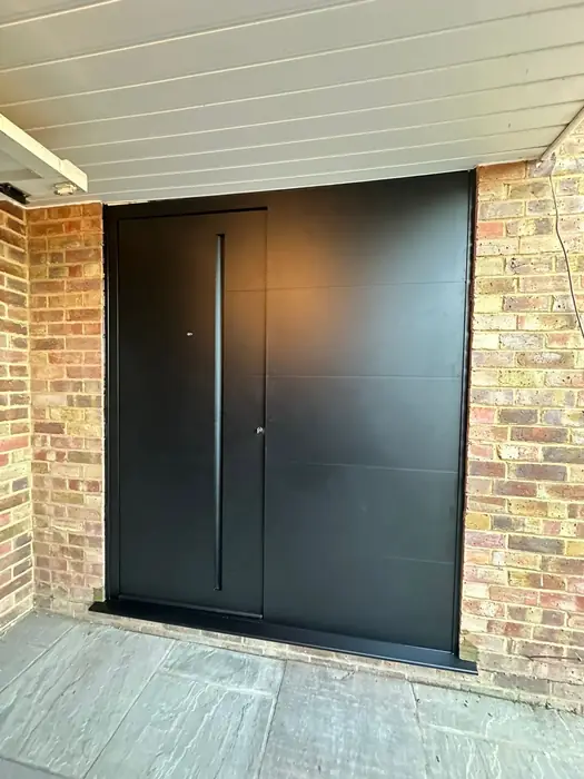Contemporary aluminium front door installed by Team Frames in Surrey