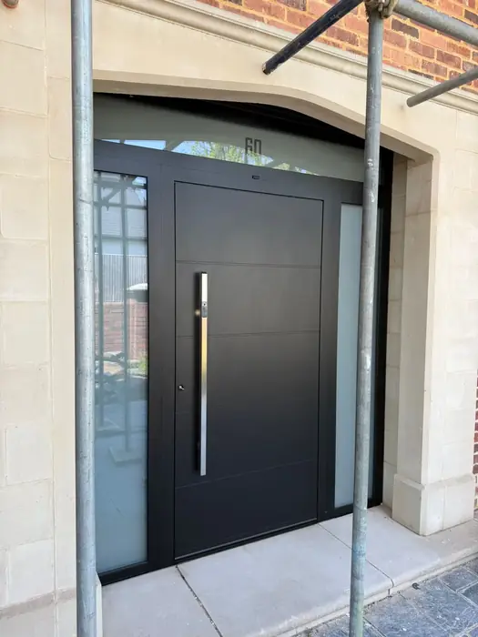Contemporary aluminium front door installed by Team Frames in Surrey
