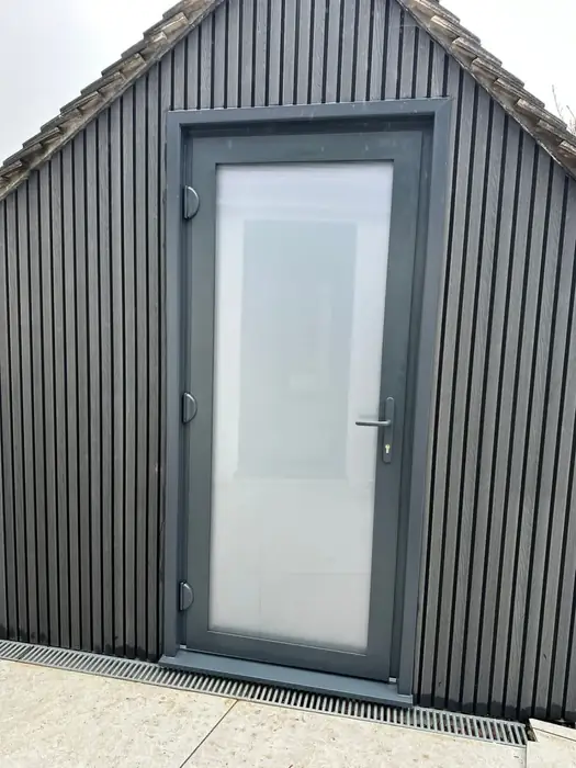 Aluminium back door with glazed panel fitted by Team Frames