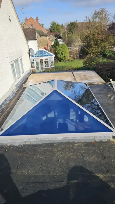 Blue-tinted glazed roof lantern fitted by Team Frames